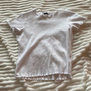 white tee with ruffles